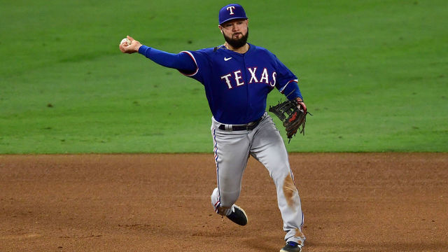 ANAHEIM, CA - SEPTEMBER 18: Isiah Kiner-Falefa #9 of the Texas Rangers throws to first for an out in the game against the Los Angeles Angels at Angel Stadium of Anaheim on September 18, 2020 in Anaheim, California.