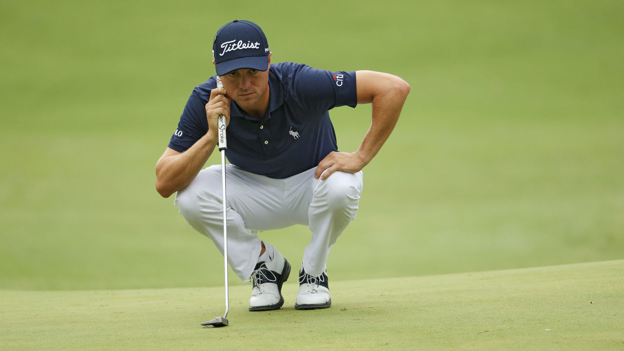 AUGUSTA, GEORGIA - NOVEMBER 15: Justin Thomas of the United States lines up a putt on the sixth green during the final round of the Masters at Augusta National Golf Club on November 15, 2020 in Augusta, Georgia.