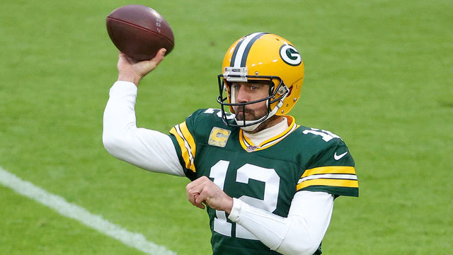 GREEN BAY, WISCONSIN - NOVEMBER 15: Aaron Rodgers #12 of the Green Bay Packers throws a pass in the first quarter against the Jacksonville Jaguars at Lambeau Field on November 15, 2020 in Green Bay, Wisconsin.