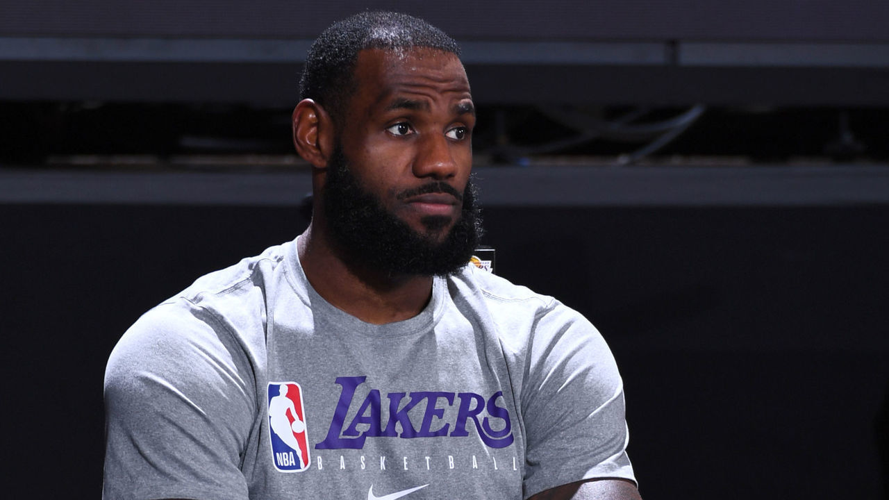 ORLANDO, FL - AUGUST 13: LeBron James #23 of the Los Angeles Lakers watches the game from the sidelines during the game on August 13, 2020 at The Field House in Orlando, Florida. NOTE TO USER: User expressly acknowledges and agrees that, by downloading and/or using this Photograph, user is consenting to the terms and conditions of the Getty Images License Agreement. Mandatory Copyright Notice: Copyright 2020 NBAE