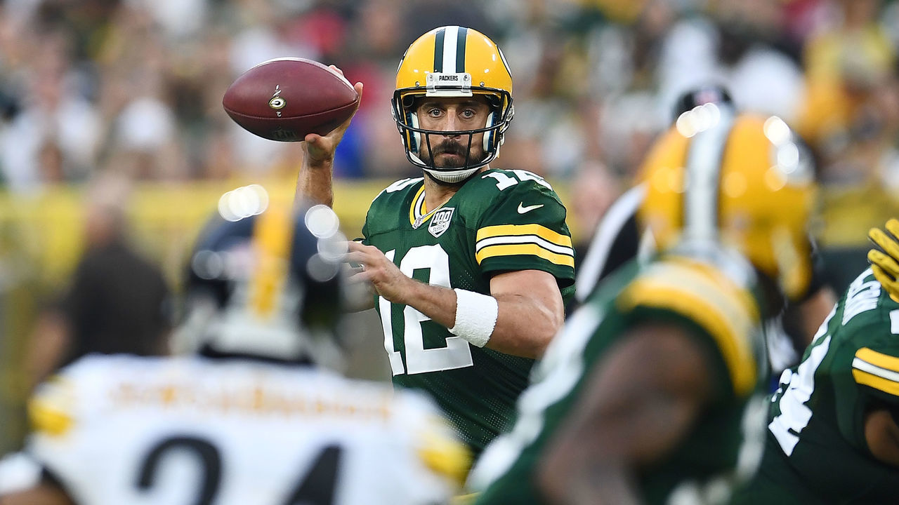 GREEN BAY, WI - AUGUST 16: Aaron Rodgers #12 of the Green Bay Packers drops back to pass during a preseason game against the Pittsburgh Steelers at Lambeau Field on August 16, 2018 in Green Bay, Wisconsin. The Packers defeated the Steelers 51-34.