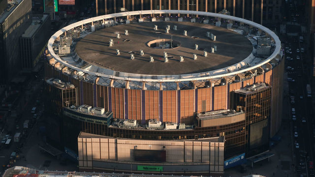 NEW YORK, NY - NOVEMBER 19: The sun sets on Madison Square Garden seen from the Eugene apartment building on November 19, 2020 in New York City.