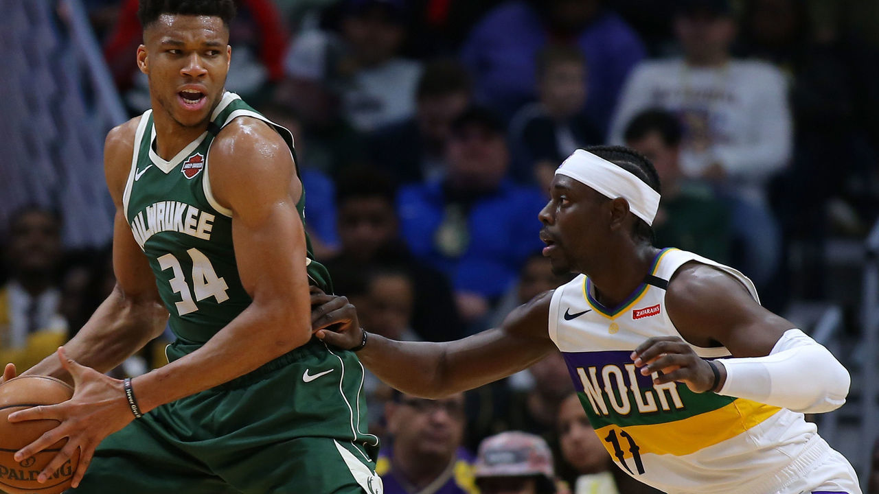 NEW ORLEANS, LOUISIANA - FEBRUARY 04: Giannis Antetokounmpo #34 of the Milwaukee Bucks drives against Jrue Holiday #11 of the New Orleans Pelicans during the second half at the Smoothie King Center on February 04, 2020 in New Orleans, Louisiana.