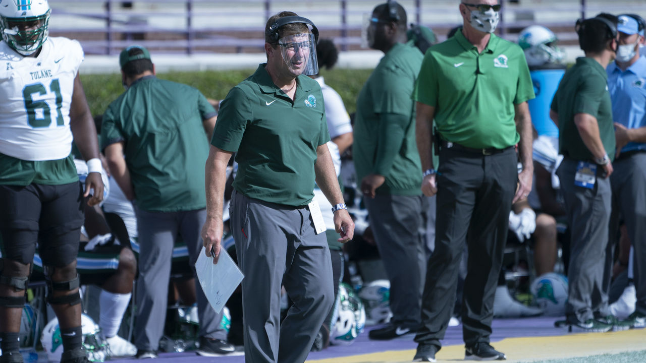 GREENVILLE, NC - NOVEMBER 07: Tulane Green Wave Offensive Coordinator Will Hall looks on from the sidelines during the first half of the College Football game between the Tulane Green Wave and the East Carolina Pirates on November 7, 2020, at Dowdy-Ficklen Stadium in Greenville, NC.