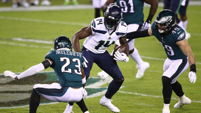 PHILADELPHIA, PA - NOVEMBER 30: Seattle Seahawks Wide Receiver DK Metcalf (14) evades a tackle from Philadelphia Eagles Safety Rodney McLeod (23) and chased by Linebacker Alex Singleton (49) in the first half during the game between the Seattle Seahawks and Philadelphia Eagles on November 30, 2020 at Lincoln Financial Field in Philadelphia, PA.