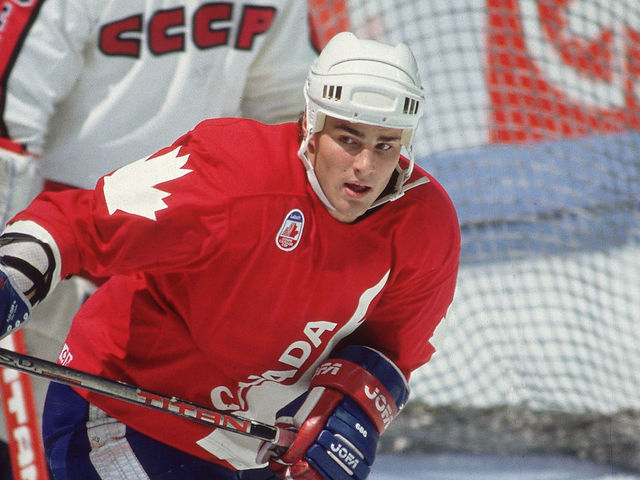 Canadian professional hockey player Eric Lindros (foreground), center for the Oshawa Generals, skates near the goal post as a member of Team Canada during a game with Team USSR at the 1991 Canada Cup, Canada, 1991.