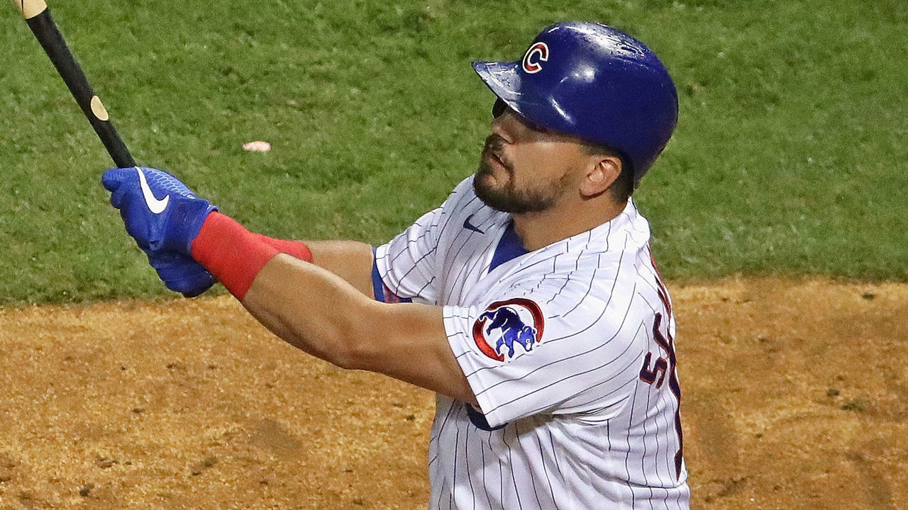 CHICAGO, ILLINOIS - AUGUST 01: Kyle Schwarber #12 of the Chicago Cubs hits a two run home run in the 8th inning against the Pittsburgh Pirates at Wrigley Field on August 01, 2020 in Chicago, Illinois.