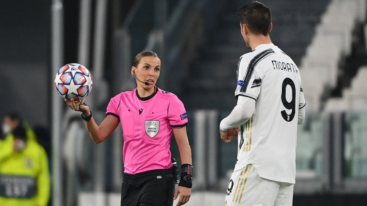 French referee Stephanie Frappart (L) talks with Juventus' Spanish forward Alvaro Morata prior to kick off the UEFA Champions League Group G football match Juventus vs Dynamo Kiev on December 2, 2020 at the Juventus stadium in Turin.