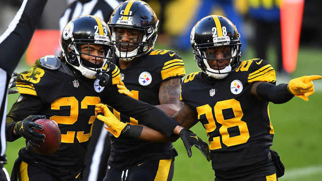 PITTSBURGH, PENNSYLVANIA - DECEMBER 02: From left, Joe Haden #23, Avery Williamson #51 and Mike Hilton #28 of the Pittsburgh Steelers celebrate following a touchdown by Haden during the first quarter against the Baltimore Ravens at Heinz Field on December 02, 2020 in Pittsburgh, Pennsylvania.