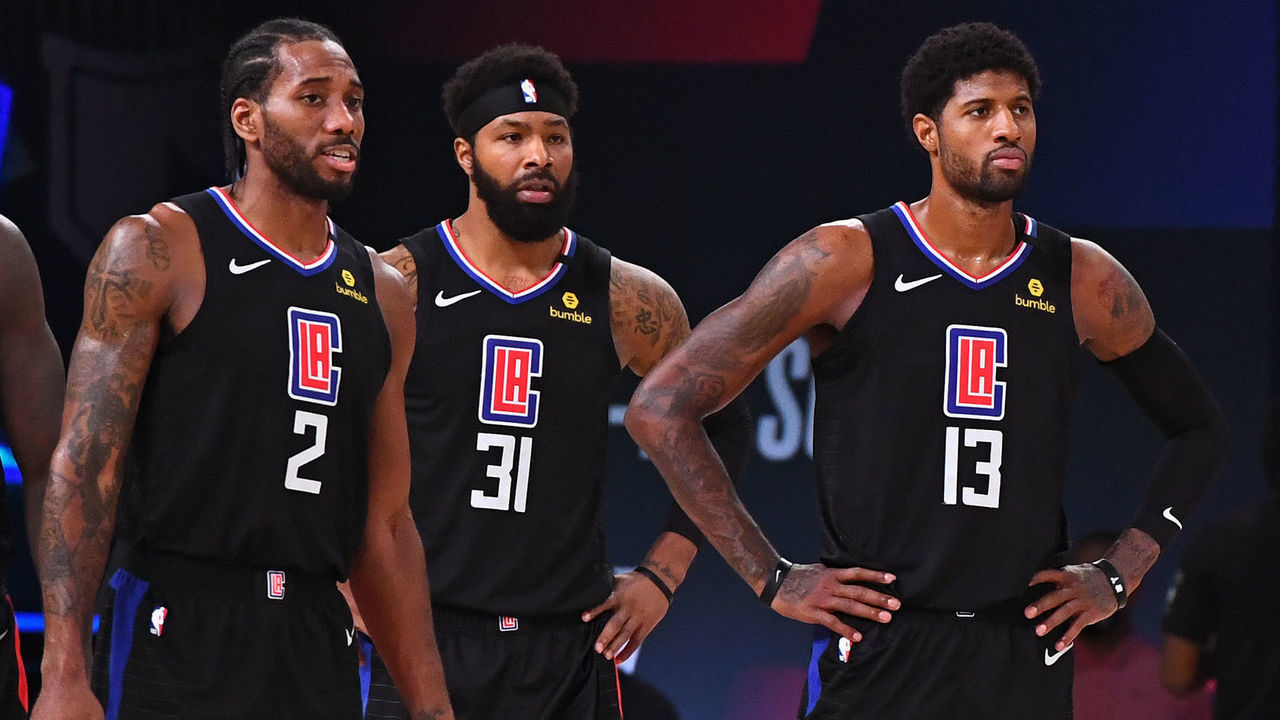 ORLANDO, FL - SEPTEMBER 15: The LA Clippers stand on the court during Game Seven of the Western Conference Semifinals of the NBA Playoffs against the Denver Nuggets on September 15, 2020 in Orlando, Florida at AdventHealth Arena. NOTE TO USER: User expressly acknowledges and agrees that, by downloading and/or using this photograph, user is consenting to the terms and conditions of the Getty Images License Agreement. Mandatory Copyright Notice: Copyright 2020 NBAE