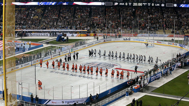 LOS ANGELES, SATURDAY, JANUARY 25, 2014 --The LA Kings and the Anaheim Ducks line up for pregame ceremonies on the infield of Dodger Stadium at the NHL Stadium Series.