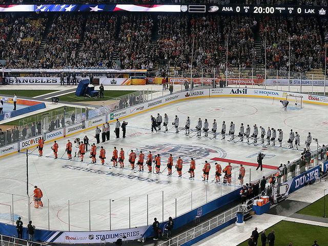 LOS ANGELES, SATURDAY, JANUARY 25, 2014 --The LA Kings and the Anaheim Ducks line up for pregame ceremonies on the infield of Dodger Stadium at the NHL Stadium Series.