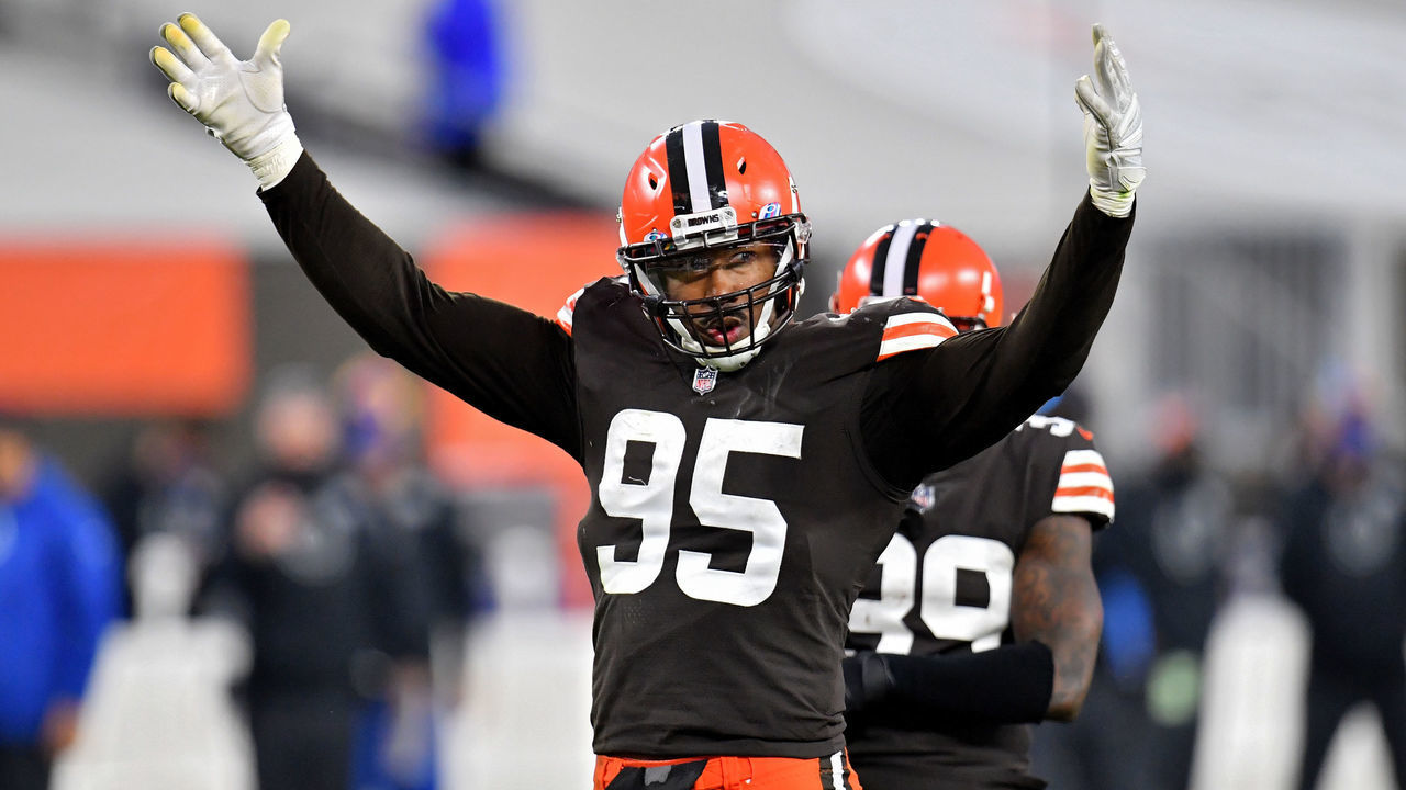 CLEVELAND, OHIO - OCTOBER 11: Myles Garrett #95 of the Cleveland Browns pumps up the crowd in the fourth quarter against the Indianapolis Colts at FirstEnergy Stadium on October 11, 2020 in Cleveland, Ohio.