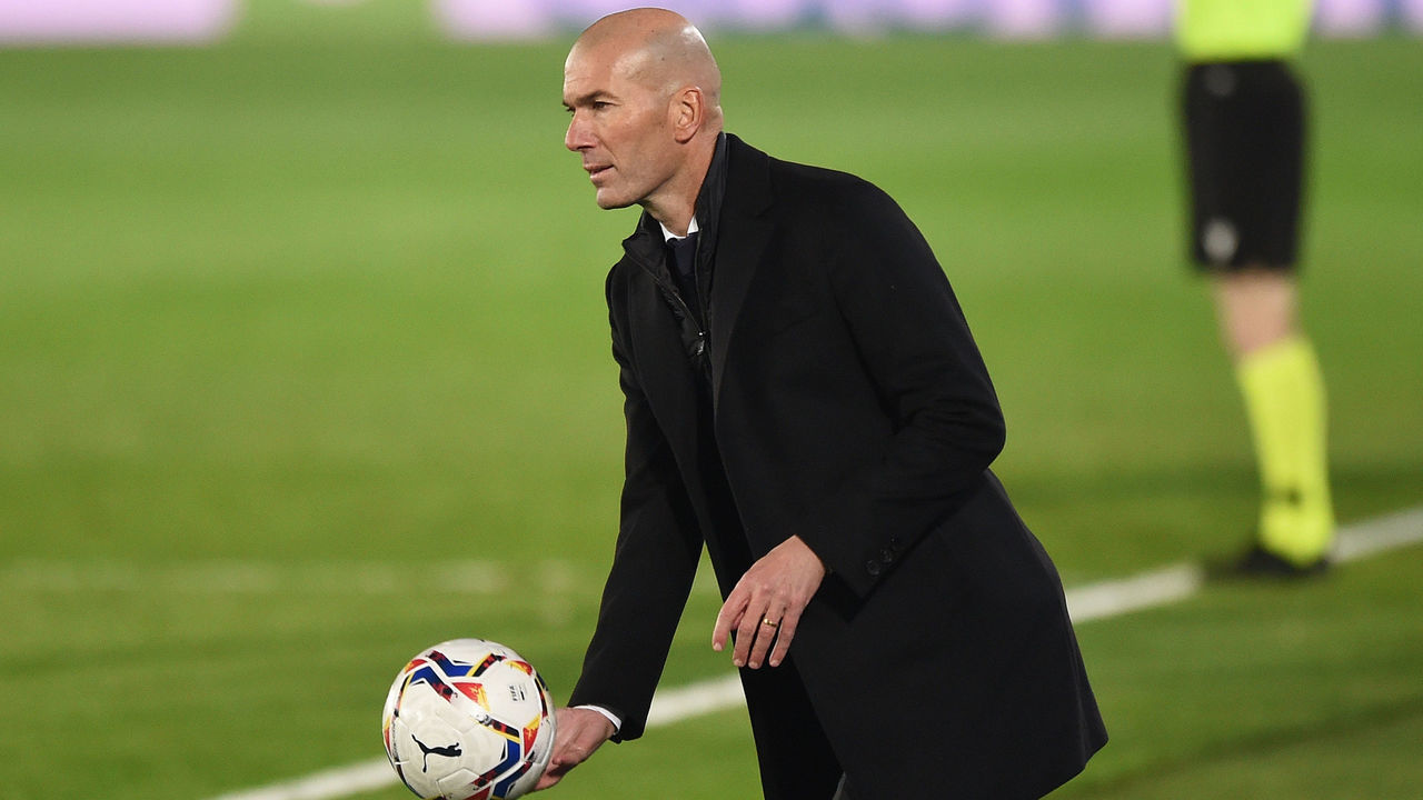 MADRID, SPAIN - NOVEMBER 28: Zinedine Zidane, head coach of Real Madrid throws the matchball back into play during the La Liga Santander match between Real Madrid and Deportivo Alaves at estadio Alfredo Di Stefano on November 28, 2020 in Madrid, Spain. Football Stadiums around Europe remain empty due to the Coronavirus Pandemic as Government social distancing laws prohibit fans inside venues resulting in fixtures being played behind closed doors.