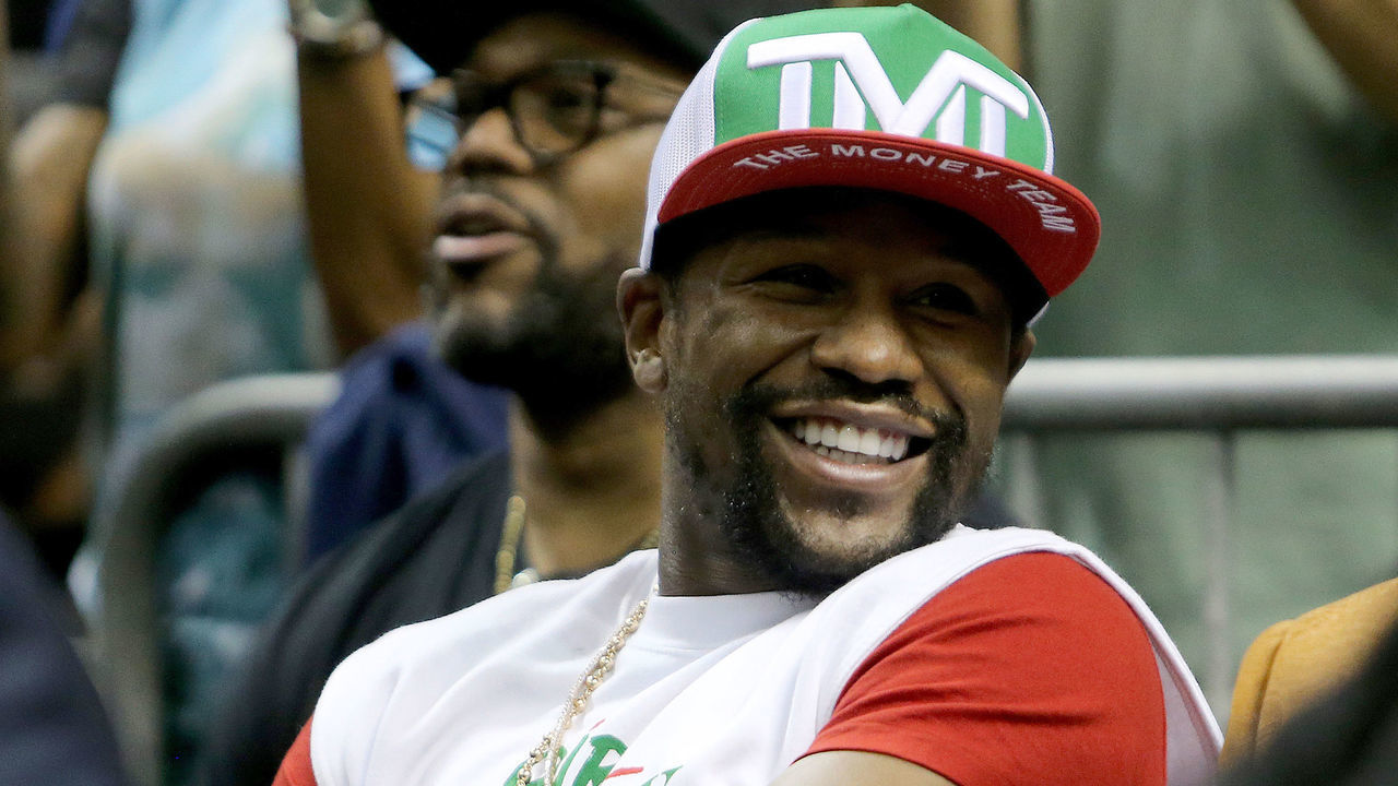 DAYTONA BEACH, FL - NOVEMBER 20: World champion boxer Floyd Mayweather Jr. sits ringside during the Fight Night in Daytona Beach boxing event at the Ocean Center on November 20, 2020 in Daytona Beach, Florida.