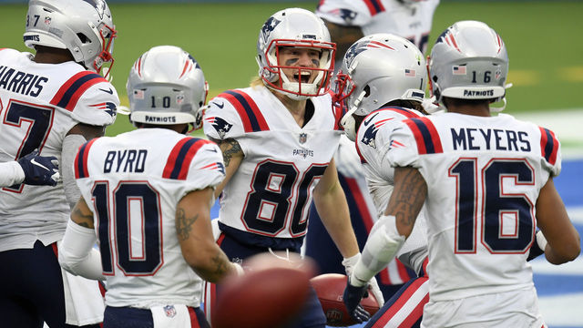 INGLEWOOD, CALIFORNIA - DECEMBER 06: Wide receiver Gunner Olszewski #80 of the New England Patriots celebrates with teammates after Olszewski scored a touchdown on a punt return in the second quarter of the game against the Los Angeles Chargers at SoFi Stadium on December 06, 2020 in Inglewood, California.