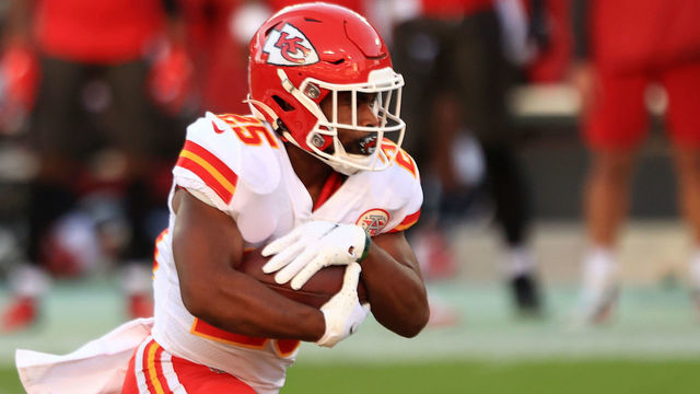 TAMPA, FLORIDA - NOVEMBER 29: Clyde Edwards-Helaire #25 of the Kansas City Chiefs carries the ball in the first quarter during their game against the Tampa Bay Buccaneers at Raymond James Stadium on November 29, 2020 in Tampa, Florida.
