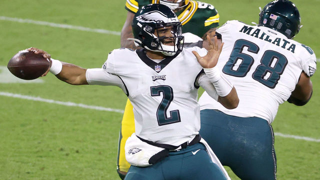 GREEN BAY, WISCONSIN - DECEMBER 06: Jalen Hurts #2 of the Philadelphia Eagles looks to pass during the fourth quarter of their game against the Green Bay Packers at Lambeau Field on December 06, 2020 in Green Bay, Wisconsin.