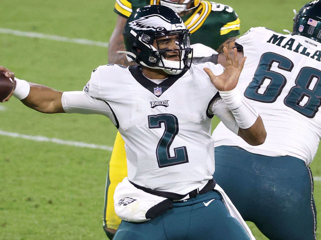GREEN BAY, WISCONSIN - DECEMBER 06: Jalen Hurts #2 of the Philadelphia Eagles looks to pass during the fourth quarter of their game against the Green Bay Packers at Lambeau Field on December 06, 2020 in Green Bay, Wisconsin.