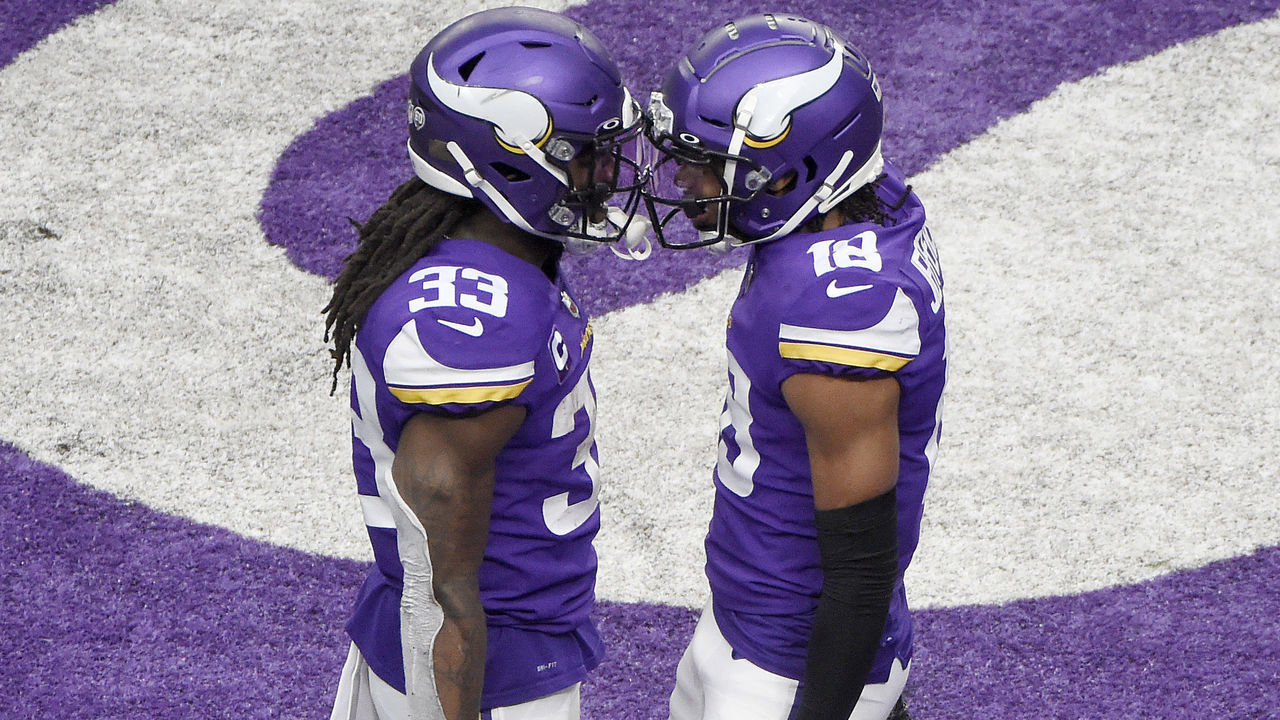 MINNEAPOLIS, MINNESOTA - DECEMBER 06: Justin Jefferson #18 of the Minnesota Vikings celebrates his touchdown with teammate Dalvin Cook #33 in the third quarter against the Jacksonville Jaguars at U.S. Bank Stadium on December 06, 2020 in Minneapolis, Minnesota.