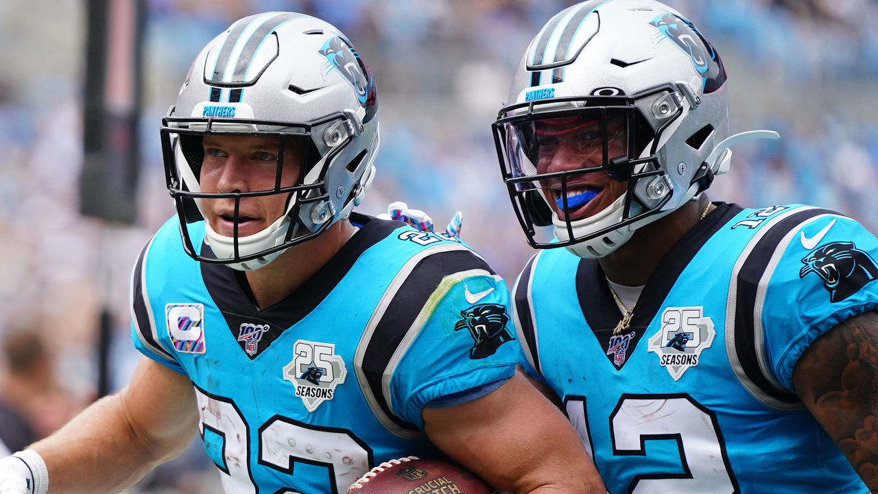 CHARLOTTE, NORTH CAROLINA - OCTOBER 06: Christian McCaffrey #22 of the Carolina Panthers and D.J. Moore #12 of the Carolina Panthers during the first half of their game against the Jacksonville Jaguars at Bank of America Stadium on October 06, 2019 in Charlotte, North Carolina.