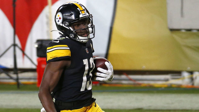 PITTSBURGH, PENNSYLVANIA - DECEMBER 07: James Washington #13 of the Pittsburgh Steelers carries the ball in for a touchdown following a reception during the second quarter of their game against the Washington Football Team at Heinz Field on December 07, 2020 in Pittsburgh, Pennsylvania.