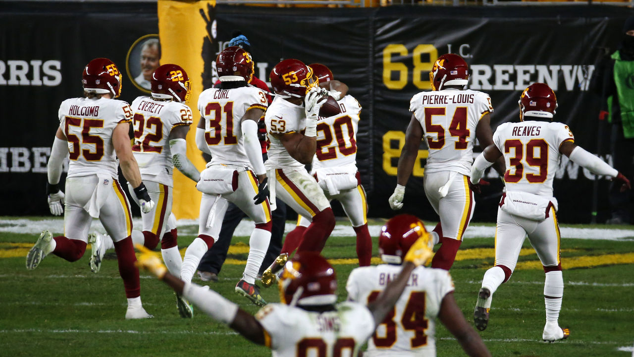 PITTSBURGH, PENNSYLVANIA - DECEMBER 07: Jon Bostic #53 of the Washington Football Team celebrates with teammates following an interception during the fourth quarter of their game against the Pittsburgh Steelers at Heinz Field on December 07, 2020 in Pittsburgh, Pennsylvania.