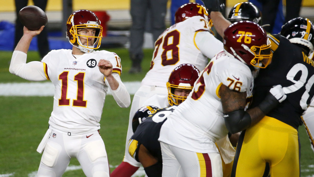 PITTSBURGH, PENNSYLVANIA - DECEMBER 07: Alex Smith #11 of the Washington Football Team looks to pass during the first quarter of their game against the Pittsburgh Steelers at Heinz Field on December 07, 2020 in Pittsburgh, Pennsylvania.