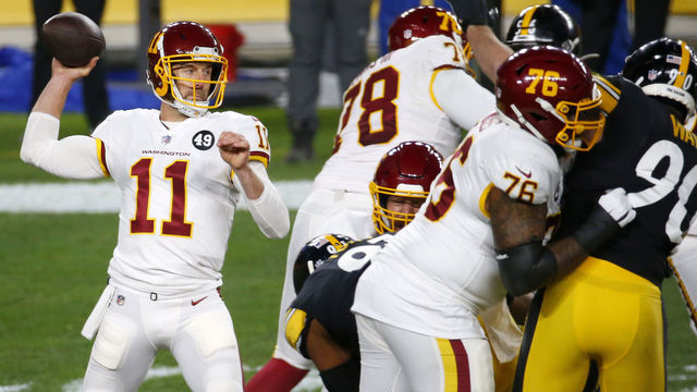 PITTSBURGH, PENNSYLVANIA - DECEMBER 07: Alex Smith #11 of the Washington Football Team looks to pass during the first quarter of their game against the Pittsburgh Steelers at Heinz Field on December 07, 2020 in Pittsburgh, Pennsylvania.