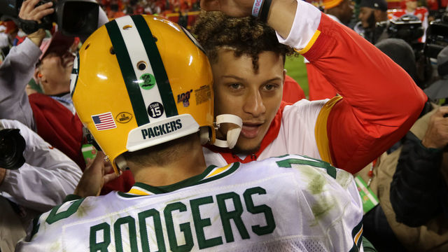 KANSAS CITY, MO - OCTOBER 27: Green Bay Packers quarterback Aaron Rodgers (12) and Kansas City Chiefs quarterback Patrick Mahomes (15) hug at midfield after an NFL game between the Green Bay Packers and Kansas City Chiefs on October 27, 2019 at Arrowhead Stadium in Kansas City, MO.