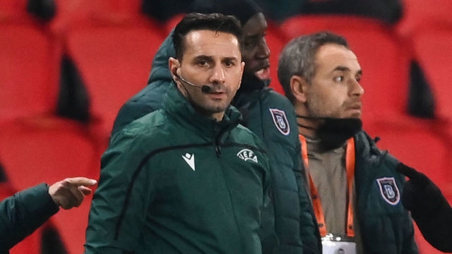 Romanian 4th referee Sebastian Coltescu looks on during the UEFA Champions League group H football match between Paris Saint-Germain (PSG) and Istanbul Basaksehir FK at the Parc des Princes stadium in Paris, on December 8, 2020. - Paris Saint-Germain's decisive Champions League game with Istanbul Basaksehir was suspended today in the first half as the players walked off amid allegations of racism by one of the match officials. The row erupted after Basaksehir assistant coach Pierre Webo, the former Cameroon international, was shown a red card during a fierce row on the touchline with staff from the Turkish club appearing to accuse the Romanian fourth official of using a racist term.