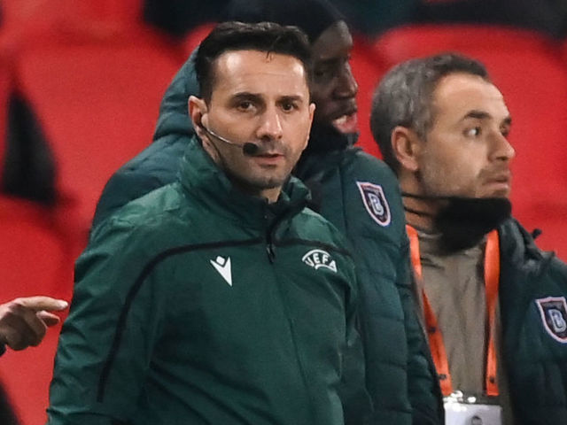 Romanian 4th referee Sebastian Coltescu looks on during the UEFA Champions League group H football match between Paris Saint-Germain (PSG) and Istanbul Basaksehir FK at the Parc des Princes stadium in Paris, on December 8, 2020. - Paris Saint-Germain's decisive Champions League game with Istanbul Basaksehir was suspended today in the first half as the players walked off amid allegations of racism by one of the match officials. The row erupted after Basaksehir assistant coach Pierre Webo, the former Cameroon international, was shown a red card during a fierce row on the touchline with staff from the Turkish club appearing to accuse the Romanian fourth official of using a racist term.
