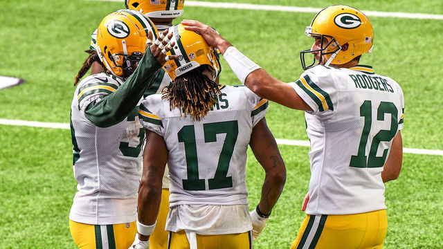 MINNEAPOLIS, MN - SEPTEMBER 13: Green Bay Packers Wide Receiver Davante Adams (17) is congratulated on his 3rd quarter 1-yard touchdown reception by Green Bay Packers Quarterback Aaron Rodgers (12) and Green Bay Packers Running Back Aaron Jones (33) during a National Football League game between the Minnesota Vikings and Green Bay Packers on September 13, 2020, at US Bank Stadium, Minneapolis, MN.