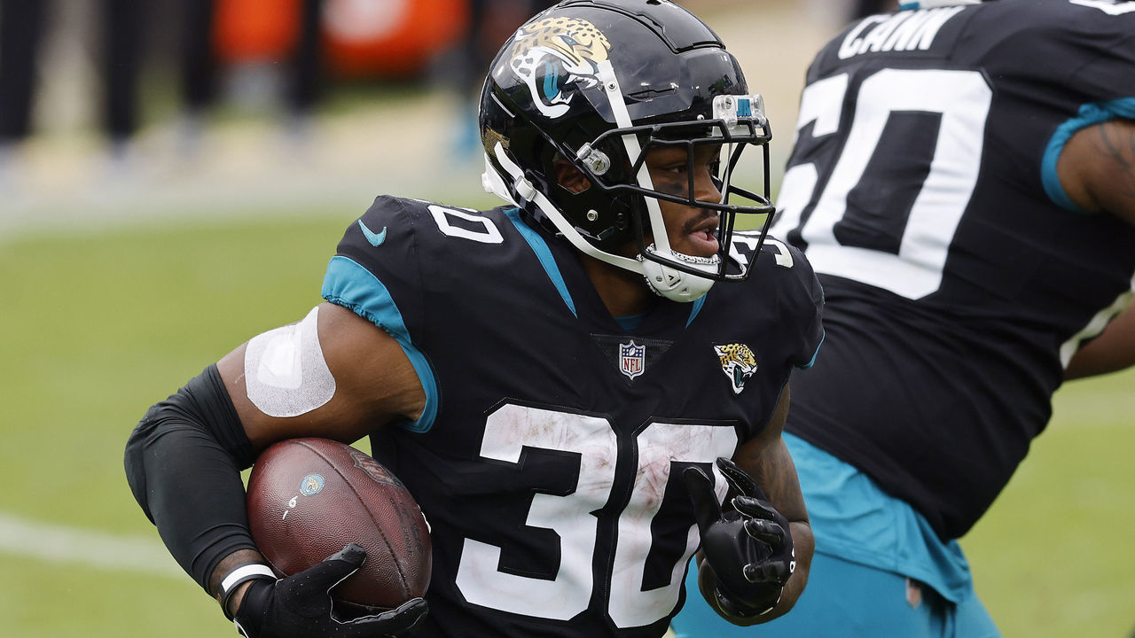 JACKSONVILLE, FLORIDA - NOVEMBER 22: James Robinson #30 of the Jacksonville Jaguars runs with the ball against the Pittsburgh Steelers at TIAA Bank Field on November 22, 2020 in Jacksonville, Florida.