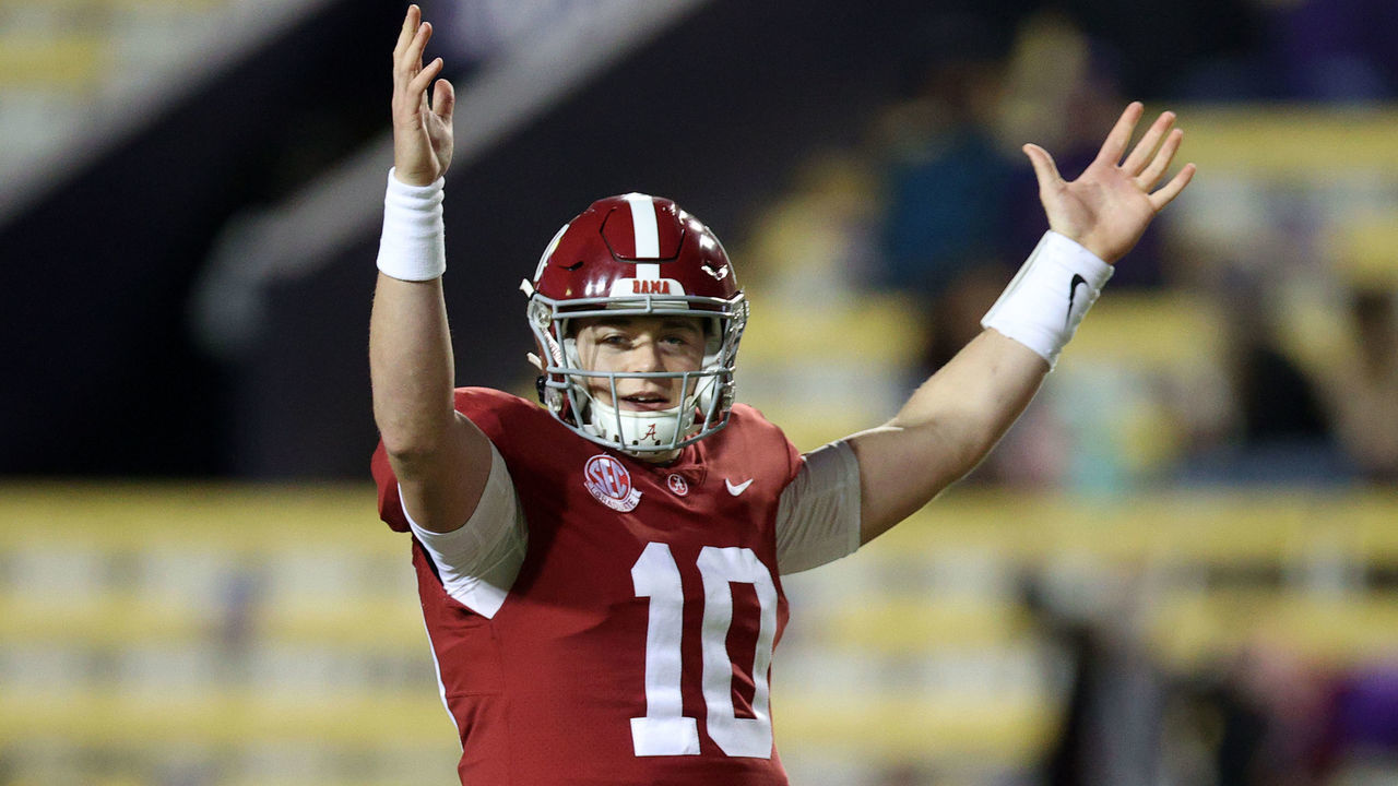 BATON ROUGE, LOUISIANA - DECEMBER 05: Mac Jones #10 of the Alabama Crimson Tide reacts after a touchdown against the LSU Tigers at Tiger Stadium on December 05, 2020 in Baton Rouge, Louisiana.