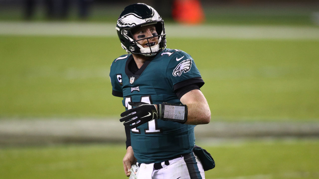 PHILADELPHIA, PA - NOVEMBER 30: Philadelphia Eagles Quarterback Carson Wentz (11) looks on as he walks to the sideline in the second half during the game between the Seattle Seahawks and Philadelphia Eagles on November 30, 2020 at Lincoln Financial Field in Philadelphia, PA.