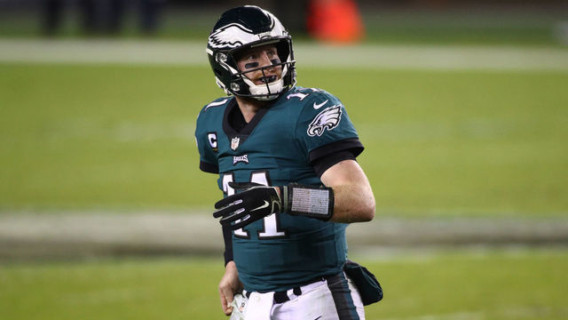 PHILADELPHIA, PA - NOVEMBER 30: Philadelphia Eagles Quarterback Carson Wentz (11) looks on as he walks to the sideline in the second half during the game between the Seattle Seahawks and Philadelphia Eagles on November 30, 2020 at Lincoln Financial Field in Philadelphia, PA.