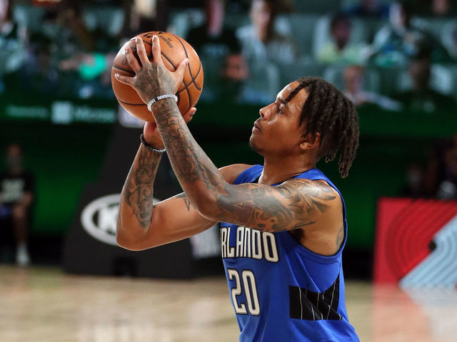 Orlando, FL - AUGUST 29: Markelle Fultz #20 of the Orlando Magic shoots a three point basket during the game against the Milwaukee Bucks during Round One Game Five of the NBA Playoffs on August 29, 2020 at The AdventHealth Arena at ESPN Wide World Of Sports Complex in Orlando, Florida. NOTE TO USER: User expressly acknowledges and agrees that, by downloading and/or using this Photograph, user is consenting to the terms and conditions of the Getty Images License Agreement. Mandatory Copyright Notice: Copyright 2020 NBAE