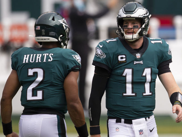 PHILADELPHIA, PA - SEPTEMBER 27: Jalen Hurts #2 and Carson Wentz #11 of the Philadelphia Eagles look on prior to the game against the Cincinnati Bengals at Lincoln Financial Field on September 27, 2020 in Philadelphia, Pennsylvania.