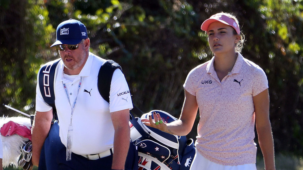 HOUSTON, TEXAS - DECEMBER 09: Lexi Thompson walks alongside her caddie and equipment representative Ben Schomin during practice ahead of the 75th U.S. Women's Open Championship at Champions Golf Club on December 09, 2020 in Houston, Texas.