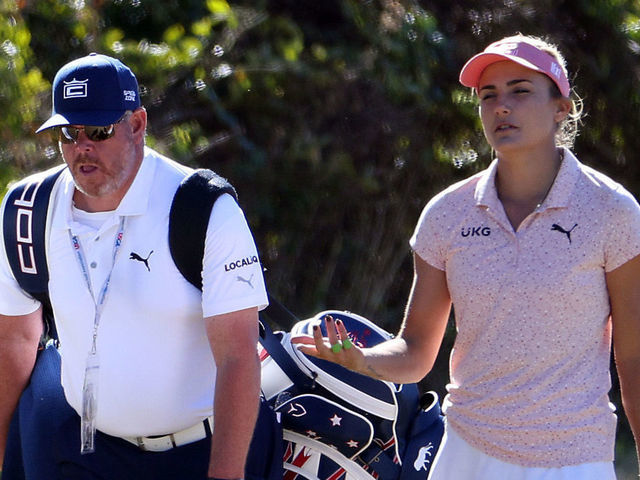 HOUSTON, TEXAS - DECEMBER 09: Lexi Thompson walks alongside her caddie and equipment representative Ben Schomin during practice ahead of the 75th U.S. Women's Open Championship at Champions Golf Club on December 09, 2020 in Houston, Texas.