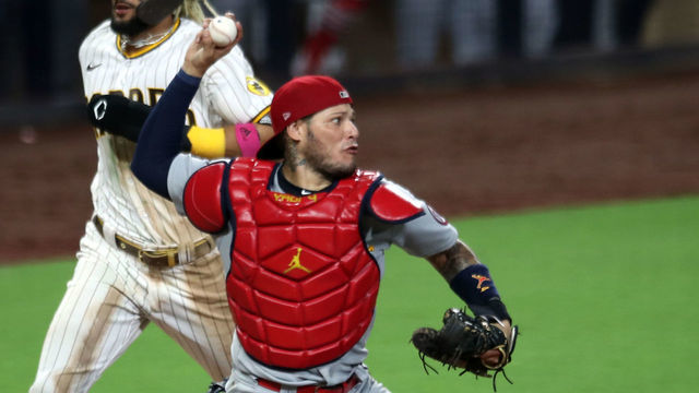 SAN DIEGO, CA - OCTOBER 02: Yadier Molina #4 of the St. Louis Cardinals turns a double play in the seventh inning during Game 3 of the Wild Card Series between the St. Louis Cardinals and the San Diego Padres at Petco Park on Friday, October 2, 2020 in San Diego, California.