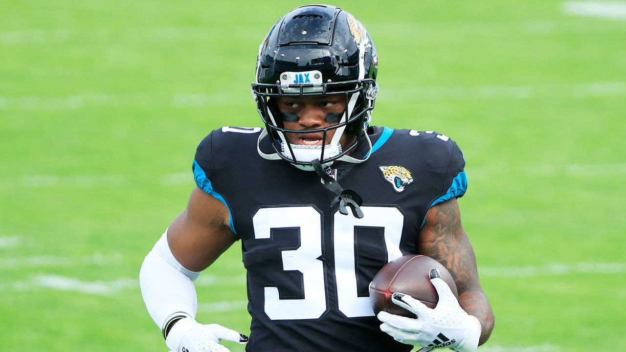 JACKSONVILLE, FLORIDA - NOVEMBER 29: James Robinson #30 of the Jacksonville Jaguars warms up prior to their game against the Cleveland Browns at TIAA Bank Field on November 29, 2020 in Jacksonville, Florida.
