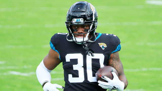 JACKSONVILLE, FLORIDA - NOVEMBER 29: James Robinson #30 of the Jacksonville Jaguars warms up prior to their game against the Cleveland Browns at TIAA Bank Field on November 29, 2020 in Jacksonville, Florida.