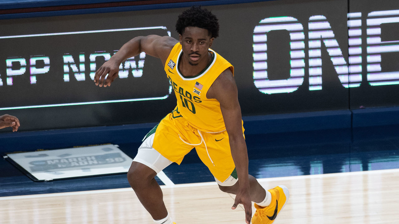 INDIANAPOLIS, IN - DECEMBER 02: Baylor Bears guard Adam Flagler (10) dribbles on the perimeter during the men's Jimmy V Classic college basketball game between the Baylor Bears and Illinois Fighting Illini on December 2, 2020, at Bankers Life Fieldhouse in Indianapolis, IN.