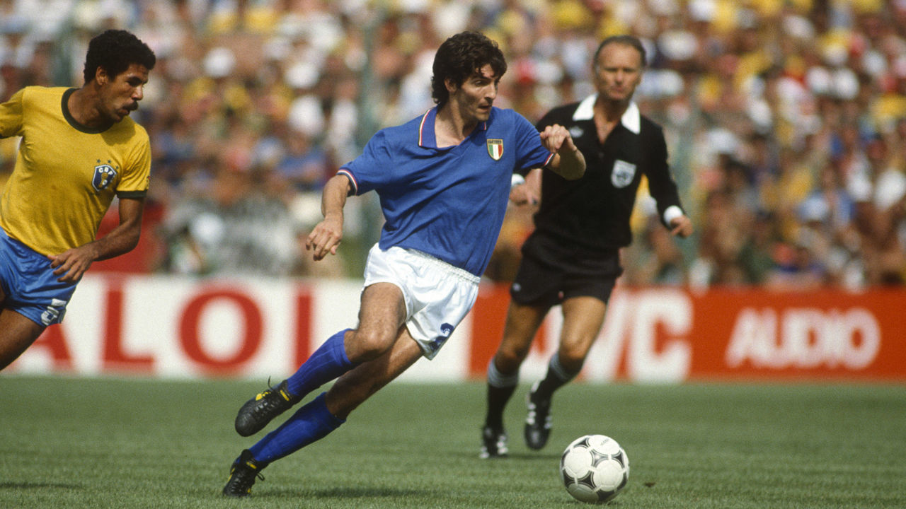 05 July 1982 - FIFA World Cup - Italy v Brazil - Paolo Rossi of Italy gets away from Toninho Cerezo of Brazil -