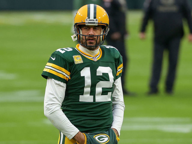 GREEN BAY, WISCONSIN - NOVEMBER 15: Aaron Rodgers #12 of the Green Bay Packers warms up before the game against the Jacksonville Jaguars at Lambeau Field on November 15, 2020 in Green Bay, Wisconsin.
