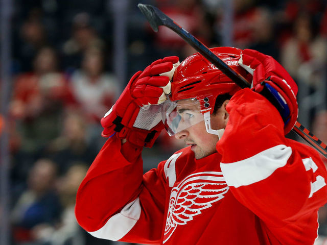 DETROIT, MI - FEBRUARY 03: Detroit Red Wings forward Dylan Larkin (71) adjusts his helmet during a regular season NHL hockey game between the Philadelphia Flyers and the Detroit Red Wings on January 3, 2020, at Little Caesars Arena in Detroit, Michigan.