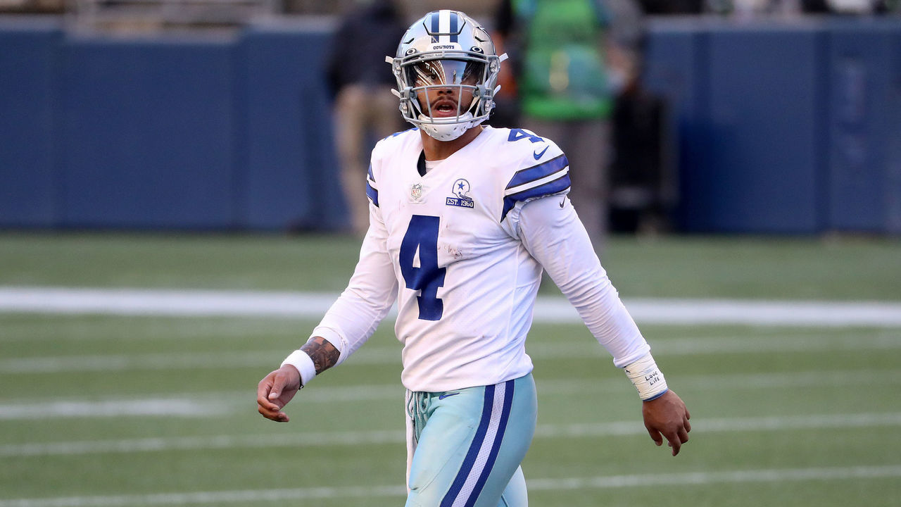 SEATTLE, WASHINGTON - SEPTEMBER 27: Dak Prescott #4 of the Dallas Cowboys reacts after throwing an interception to Ryan Neal #35 of the Seattle Seahawks during the fourth quarter in the game at CenturyLink Field on September 27, 2020 in Seattle, Washington.