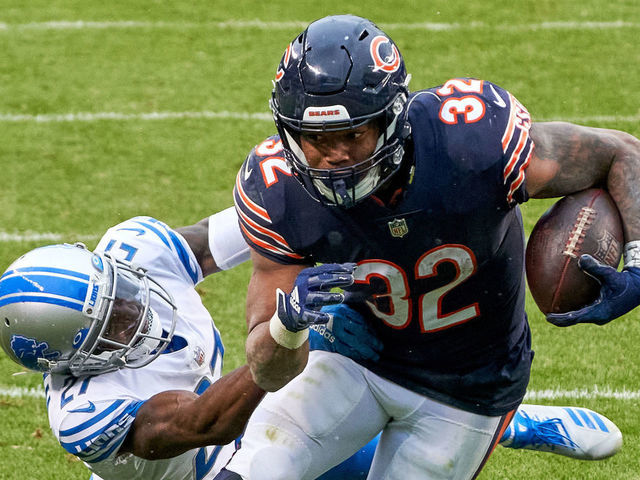 CHICAGO, IL - DECEMBER 06: Chicago Bears running back David Montgomery (32) battles with Detroit Lions defensive back Tracy Walker (21) in action during a game between the Chicago Bears and the Detroit Lions on December 06, 2020, at Soldier Field in Chicago, IL.